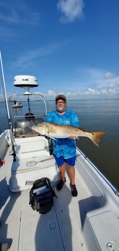 Fishing charter guest on the water.