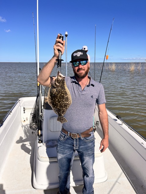 Fishing charter guest on the water.
